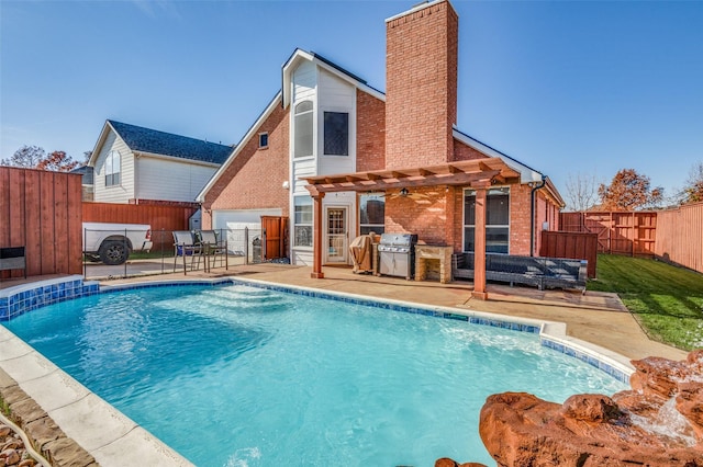 rear view of house with a pergola, area for grilling, a patio, and a fenced in pool