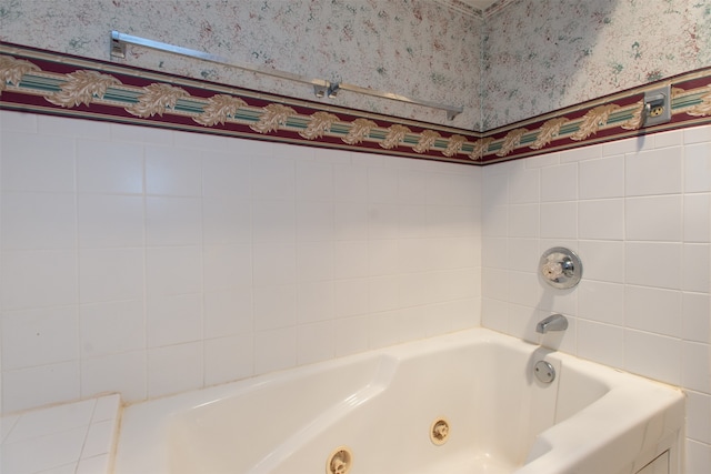 bathroom with a tub to relax in