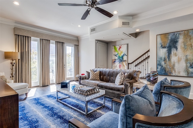 living room featuring ornamental molding, hardwood / wood-style floors, and ceiling fan