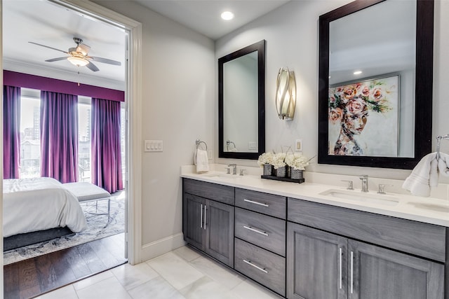 bathroom with vanity, hardwood / wood-style flooring, and ceiling fan