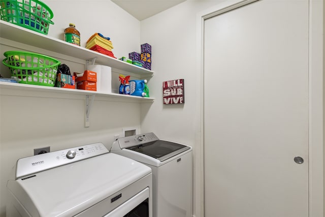 washroom with separate washer and dryer