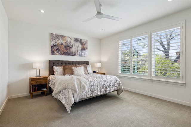 carpeted bedroom featuring ceiling fan