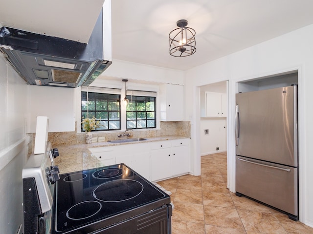 kitchen featuring sink, decorative light fixtures, white cabinetry, stainless steel appliances, and range hood