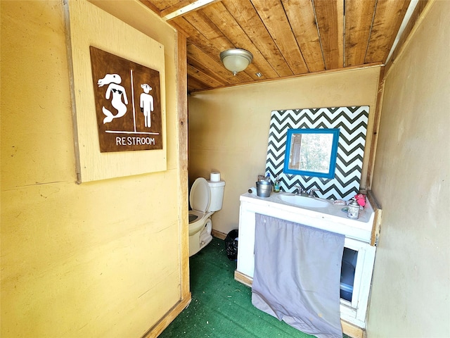 misc room featuring wood ceiling and sink