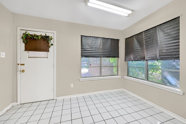 interior space with light tile patterned floors