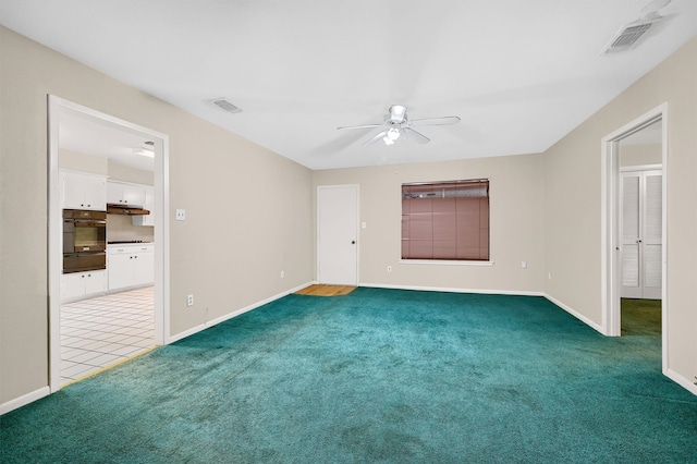 interior space featuring ceiling fan