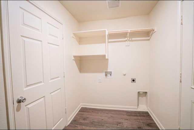 laundry area with washer hookup, hookup for a gas dryer, dark hardwood / wood-style floors, and electric dryer hookup