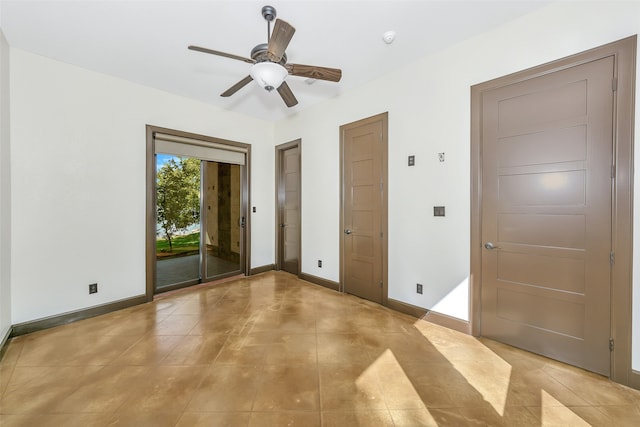 unfurnished room featuring ceiling fan