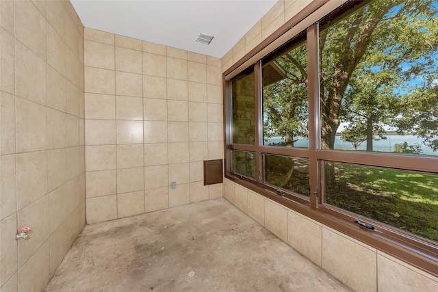 bathroom featuring concrete flooring