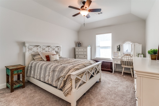 carpeted bedroom featuring ceiling fan and lofted ceiling