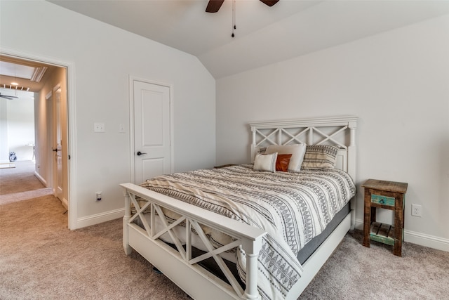 carpeted bedroom featuring lofted ceiling and ceiling fan