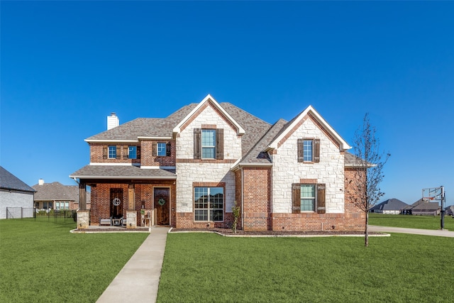 view of front of house with a front lawn