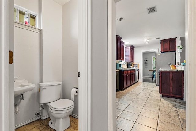 bathroom featuring toilet