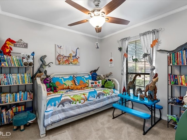 bedroom with carpet floors, ornamental molding, and ceiling fan