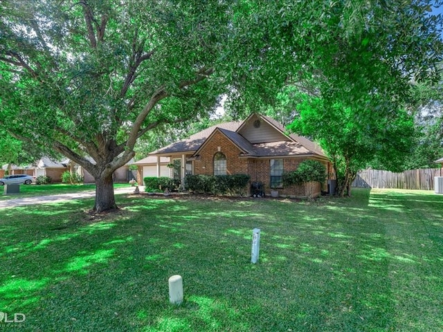 view of front of home with a front lawn