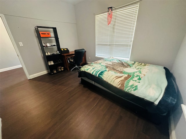 bedroom featuring dark hardwood / wood-style floors