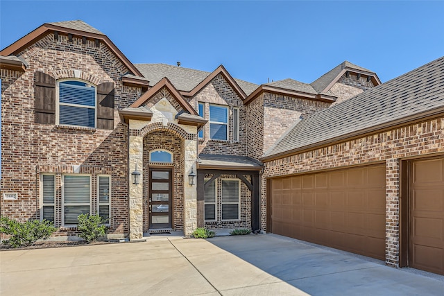 view of front of property featuring a garage