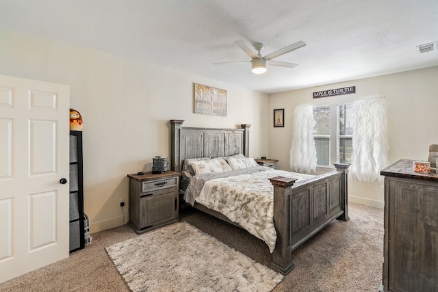 bedroom with light carpet and ceiling fan