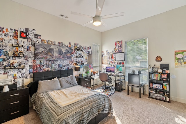 carpeted bedroom featuring ceiling fan