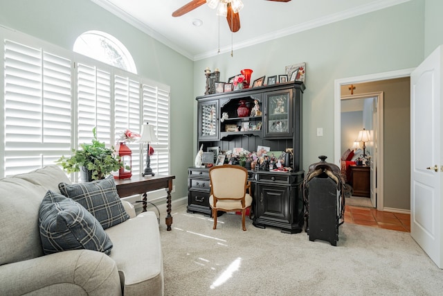 home office with carpet floors, crown molding, and ceiling fan