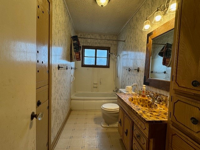 full bathroom with toilet, a textured ceiling, vanity, and washtub / shower combination