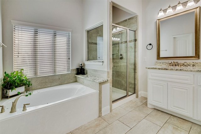 bathroom with separate shower and tub, tile patterned flooring, and vanity