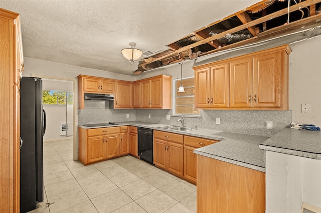 kitchen with pendant lighting, light tile patterned floors, sink, a textured ceiling, and black appliances