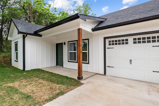 727 W Parnell St, Denison, TX 75020 - view of property exterior with roof with shingles, a garage, board and batten siding, driveway, and a yard
