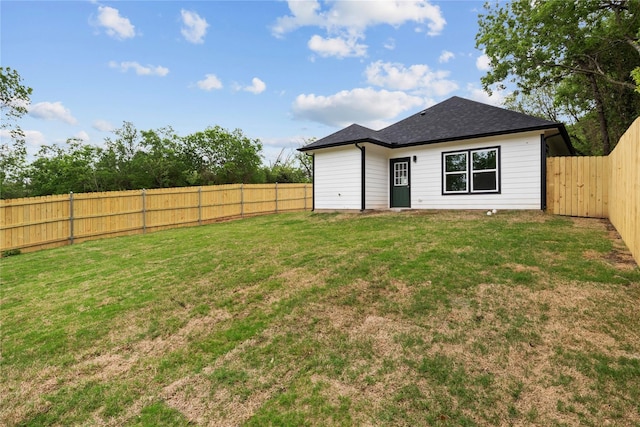 727 W Parnell St, Denison, TX 75020 - back of property with roof with shingles