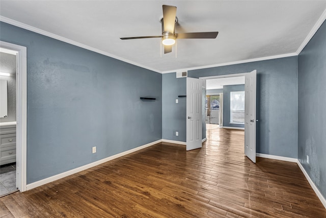 spare room featuring ceiling fan, hardwood / wood-style floors, and ornamental molding