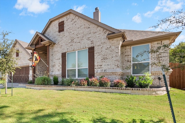 view of front of property with a front lawn