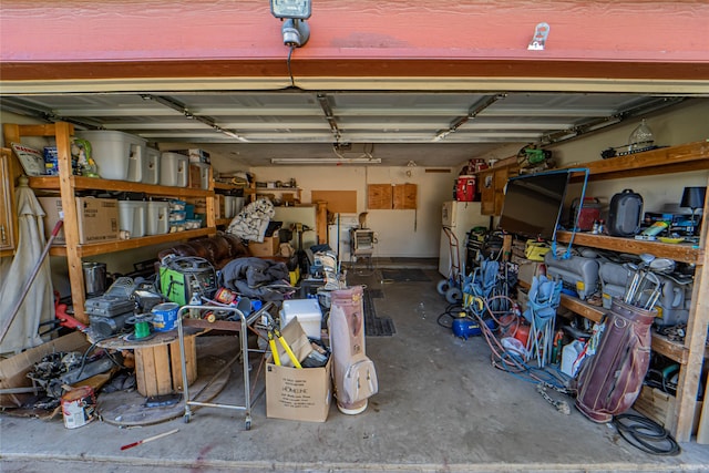 garage with white fridge