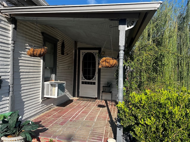 doorway to property with cooling unit