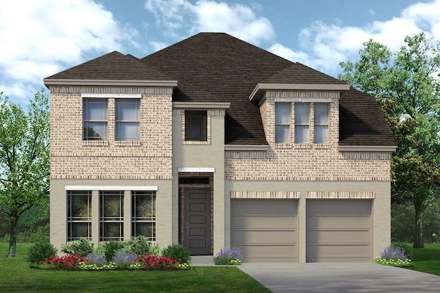 view of front facade with a garage and a front yard