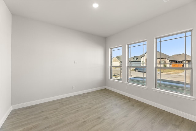 empty room featuring light hardwood / wood-style floors