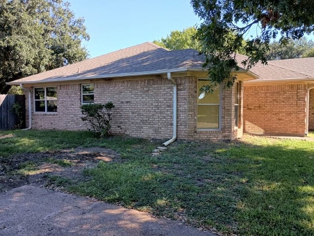 view of property exterior featuring a yard