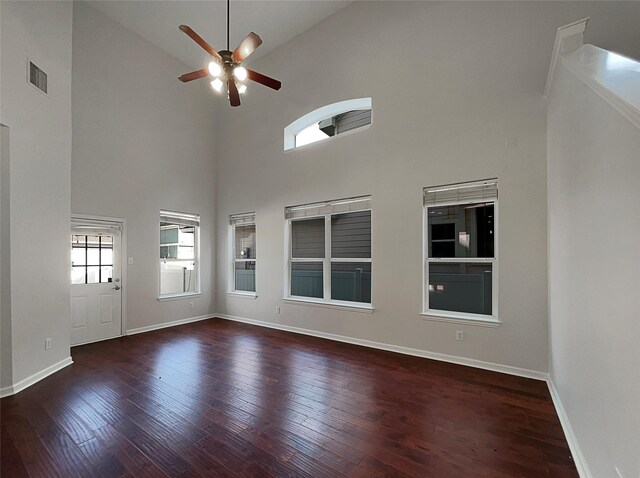 interior space with a ceiling fan, high vaulted ceiling, and wood-type flooring