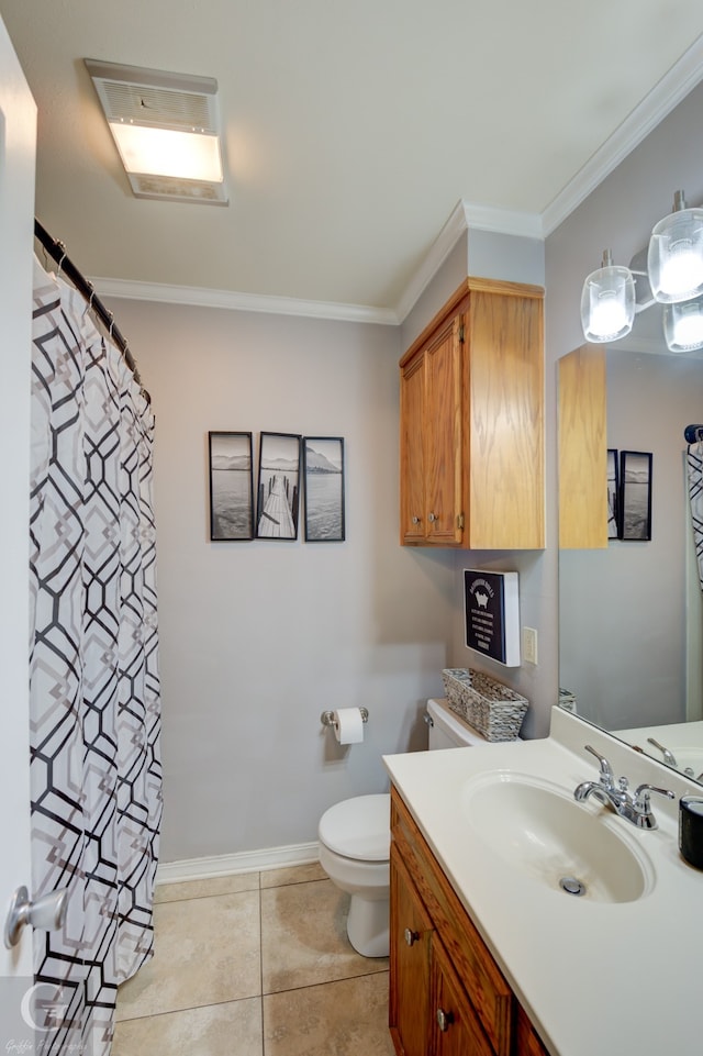 bathroom featuring vanity, crown molding, toilet, and tile patterned floors