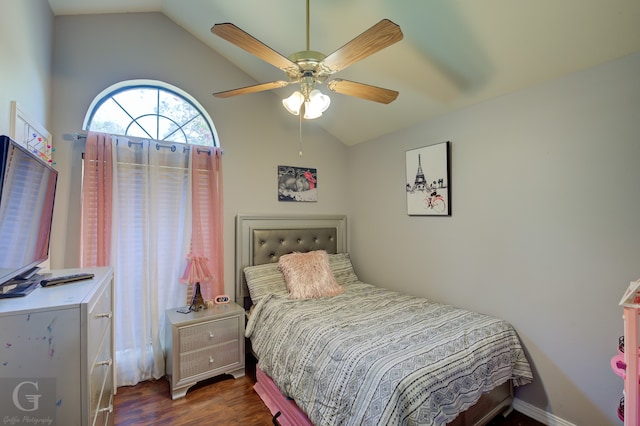 bedroom featuring ceiling fan, lofted ceiling, and dark hardwood / wood-style floors