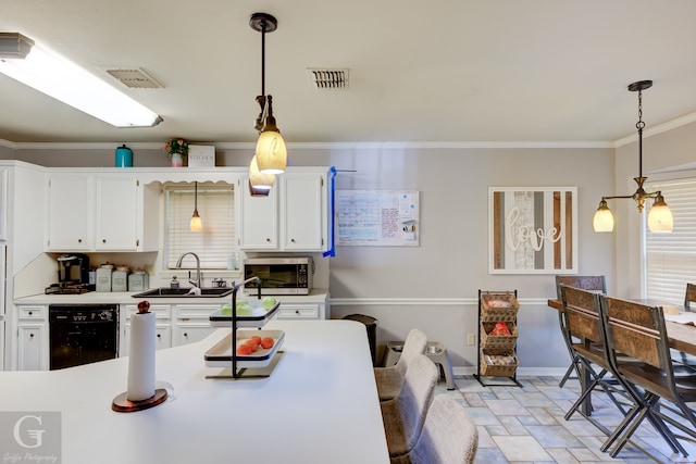 kitchen featuring sink, black dishwasher, white cabinetry, ornamental molding, and decorative light fixtures