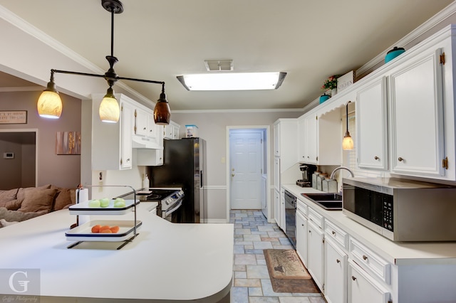 kitchen featuring sink, kitchen peninsula, white cabinetry, appliances with stainless steel finishes, and decorative light fixtures