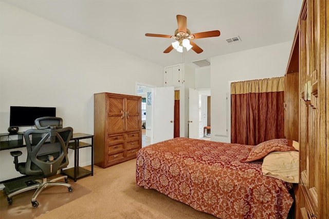 carpeted bedroom featuring ceiling fan