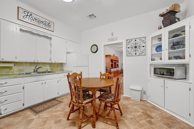 dining space with sink