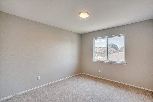 empty room with carpet floors