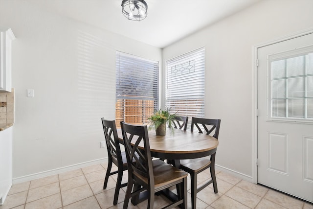 view of tiled dining space