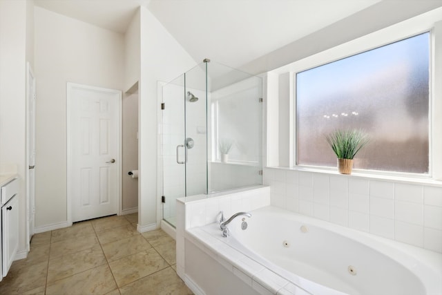 bathroom with vanity, plus walk in shower, and tile patterned floors