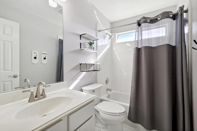 full bathroom with shower / tub combo, tile patterned flooring, toilet, and vanity