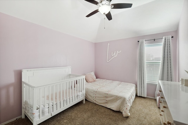 bedroom featuring carpet floors, lofted ceiling, and ceiling fan