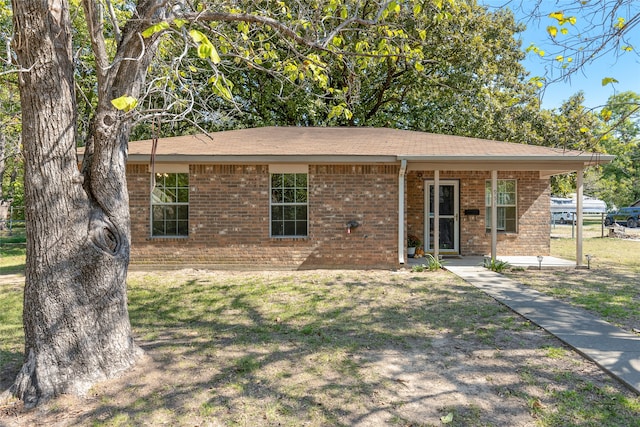 ranch-style home with a front yard