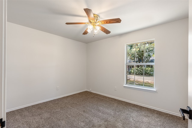 unfurnished room with carpet and ceiling fan